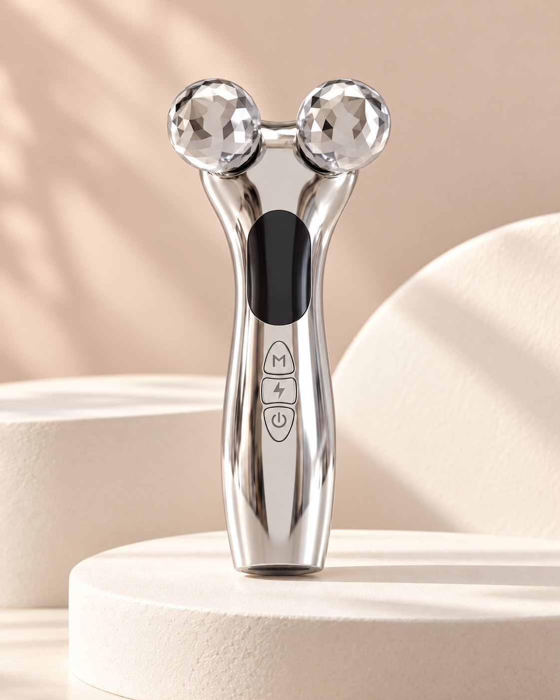 Face Reset silver microcurrent device on warm-white pedestal
